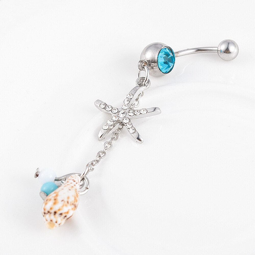 Bauchnabelpiercing Muschel Bulot Und Blaue Perlen
